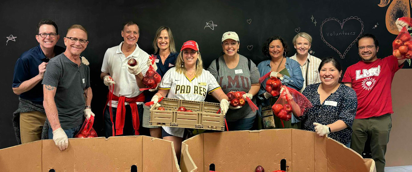 LMU Alumni group performing volunteer service